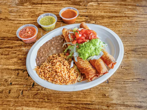Flauta plate with rice, beans, guacamole, and salsas at Pokez Mexican Restaurant